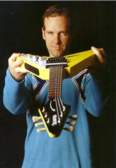 tomguitarout.jpg